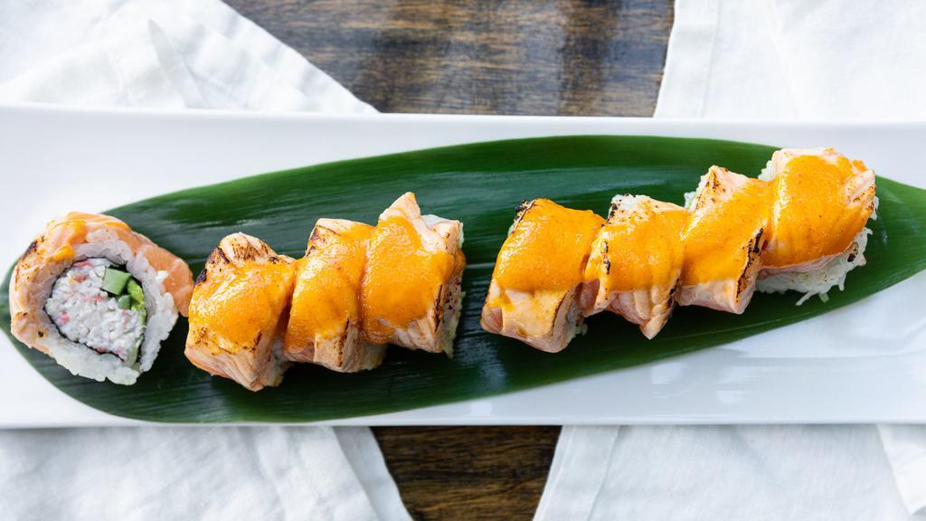Salmon Torch Roll · Crab meat, cucumber and avocado topped with torched salmon and spicy mayo.

Consuming raw seafood may increase your risk of foodborne illness.