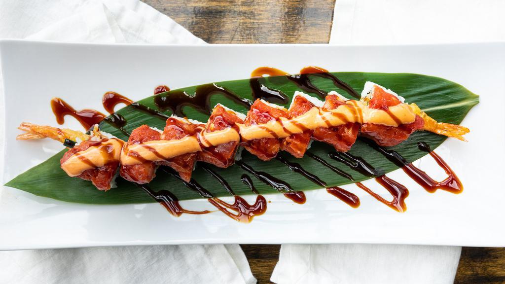 Mill Creek Roll · Shrimp tempura and cucumber topped with spicy tuna, spicy mayo and eel sauce