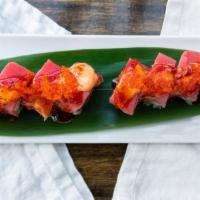 Firehouse Roll · Spicy tuna, cucumber and tempura crunch topped with tuna, tobiko, spicy mayo and hot chili s...