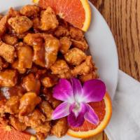 Spicy Orange Chicken · White meat chicken chunk battered and fried, then drizzled over with our chef’s spicy orange...