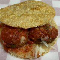 Famous Meatball · Homemade Meatballs, House Marinara Sauce topped with Parmesan Cheese, Sourdough Crust.