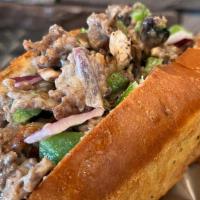 Philly Cheesesteak Sandwich · Steak, American white cheese, onion, bell peppers, mushrooms, on a New England roll