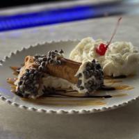 Cannoli · Cannoli shells made in house, stuffed with fresh ricotta and chocolate chips.
