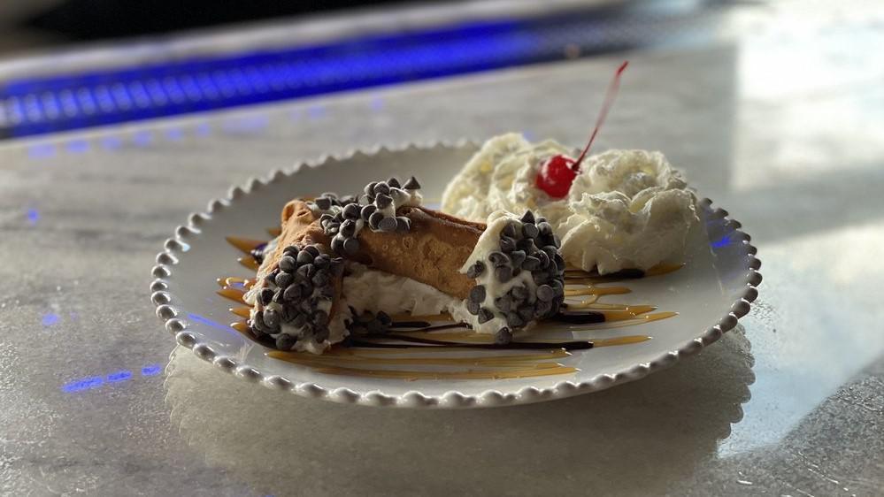 Cannoli · Cannoli shells made in house, stuffed with fresh ricotta and chocolate chips.