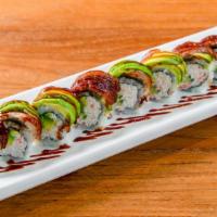 Dragon Roll · In: Tempura shrimp and cucumber. Out: Grilled eel, avocado, eel sauce