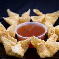 Crab Rangoon · Six deep-fried wonton wraps stuffed with crab meat, cilantro, and cream cheese. Served with ...