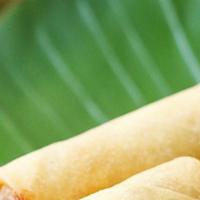 Spring Rolls · Four delicious deep-fried vegetable rolls wrapped in wheat flour rolls served with a tasty s...
