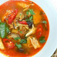 Tom Yum · Thai style and sour clear soup with a touch of lemongrass, kaffir lime leaves, chili paste, ...