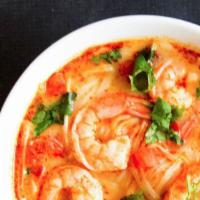 Tom Yum Kung · Thailand's famous spicy shrimp soup with a touch of lemongrass, kaffir lime leaves, chili pa...