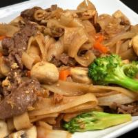 Pad See-Ew · Fresh wide rice noodles stir fried with your protein choice in a tasty dark sweet soy sauce ...