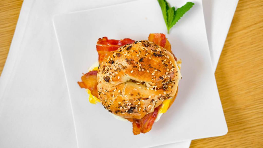 Bagel Breakfast Sandwich 🥯 · Served with XL Egg, Cheese & Choice of Protein