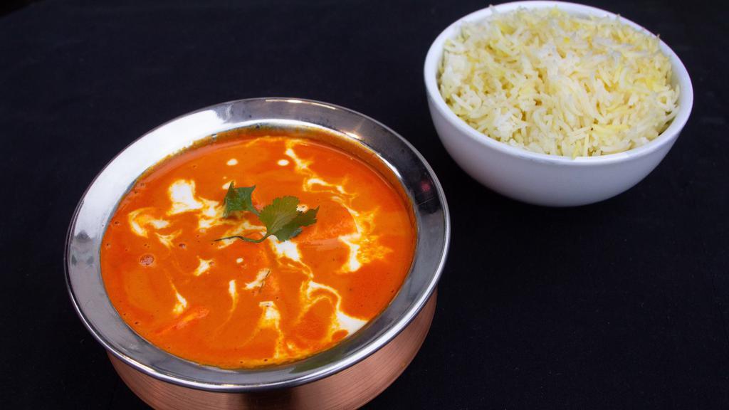Paneer Tikka Masala · Fresh Indian paneer simmered in rich tomato gravy.