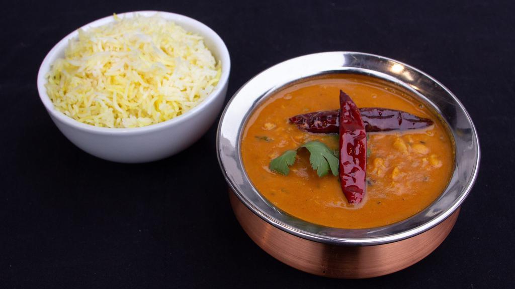 Yellow Daal · Yellow lentils cooked with onions, tomatoes and spices.