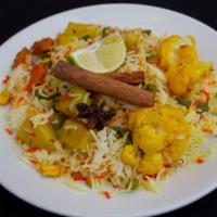 Vegetable Biryani · Seasoned vegetables and aromatic rice pilaf served with vegetable raita.