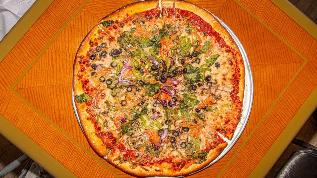 Vegetarian Pizza · Onion, green peppers, black and green olives, fresh mushrooms, fresh tomatoes.