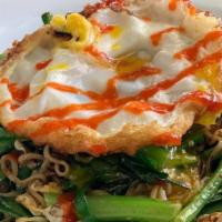 Bird'S Nest · Grilled steak, house veggies, and crispy egg noodles.