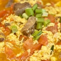 Egg Tomato With Rice Noodle Soup · Savory light broth with noodles.