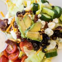 Cobb · Fresh Romaine with Olives, Eggs, Cheddar Cheese, Blue Cheese Crumbles, Tomato, Cucumber, Bac...