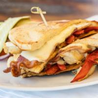 Southwestern Chicken Melt · Roasted Chicken, Peppers, Choice of Cheese, Bacon, Chipotle Ranch, Lettuce and Tomato on a F...
