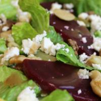Classic Beets & Walnuts · Crisp romaine, topped with beets, feta cheese, fresh garlic, walnuts, and drizzled with bals...
