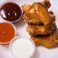 Chicken Wings · 16, or 24 pieces order with your choice of: Hot, BBQ, or plain, then choose your dipping sauce