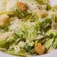 Caesar Salad  · Fresh romaine lettuce with homemade croutons & shredded Parmesan cheese Served with our home...