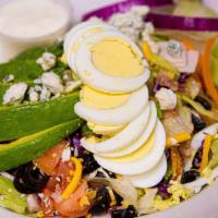 Cobb Salad · Crispy lettuce purple/green cabbage, carrots, with turkey, cheddar & blue cheese, bacon bits...