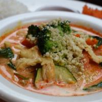 Panang Curry · Spicy. Rich panang curry with coconut milk and crushed peanuts. Served with steamed rice.