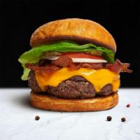 Bacon Boom Burger · American beef patty topped with melted cheese, multiple layers of crispy bacon, buttered let...
