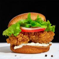 House Fatty Fried Chicken Sandwich · Crispy fried chicken topped with caper aioli, green leaf lettuce, and tomatoes. Served on a ...