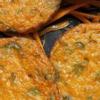 Thai Fish Cake (4Pcs) · Deep fried marinated fish cakes with Thai curry paste and chopped green bean served with swe...