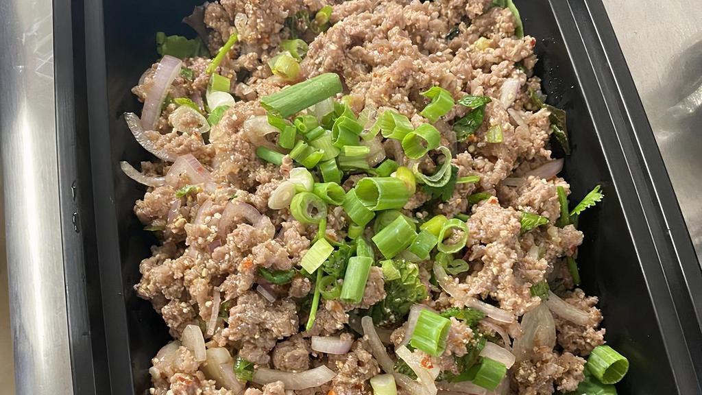 Larb (Pork Or Beef) · Ground meat with red onion, cilantro, mint leaves, roasted rice with Thai spicy lime dressing.