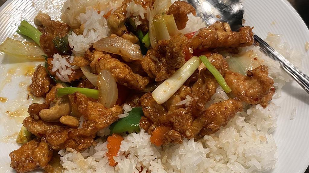 Thai Cashew Nut With Rice · Sautéed batter chicken, cashew nut, bell peppers, carrots, white &green onions, dry chili in a Thai chili paste sauce