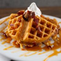 From Belgium With Love · Thick Belgian waffle served with a scoop of premium vanilla bean ice cream on top and drizzl...