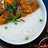 Tamarind Fish Kari · Southern style tamarind fish curry with red chili, turmeric, coriander and a hint of coconut...