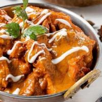Butter Chicken · (GF). An Indian menu classic, pulled chicken charred in the tandoor oven then finished in a ...