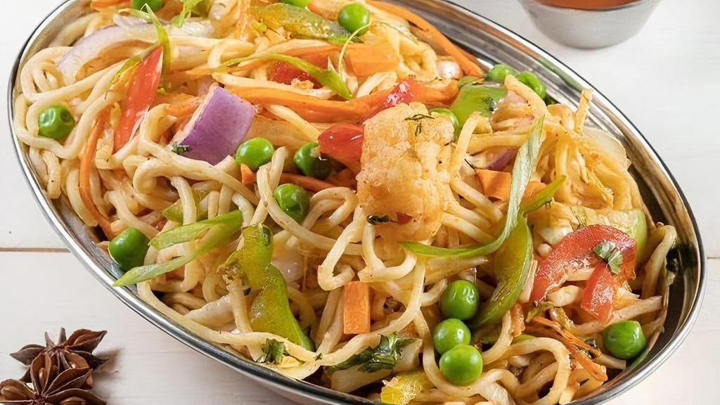 Hakka Noodles · Soft noodles tossed in a wok with fresh vegetables, sauces and condiments.