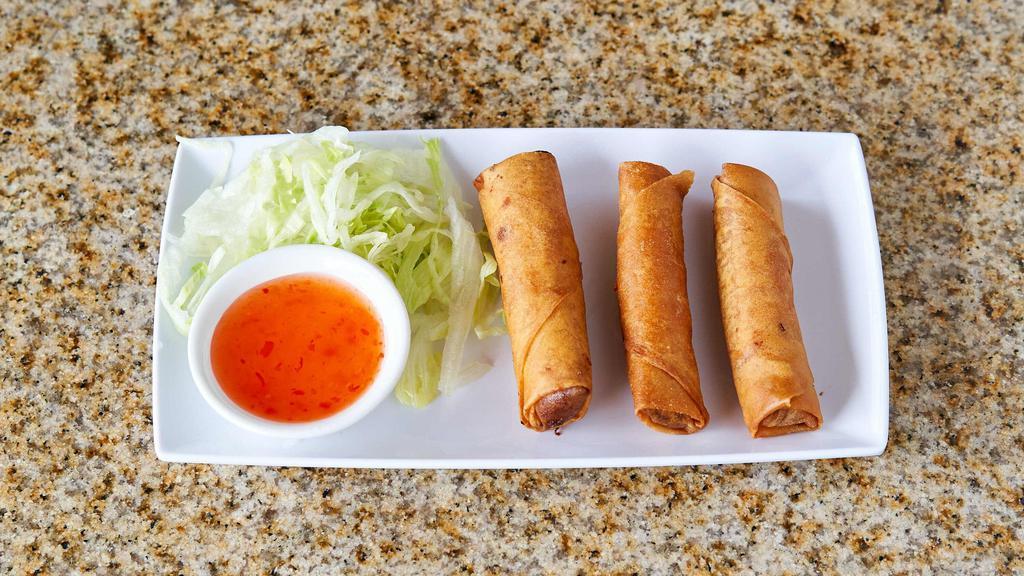 Chả Giò Chay - Vegetarian Crispy Rolls · Crispy rolls filled with tofu, glass noodles, finely chopped taro, carrots, and a side of sweet chili sauce.