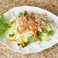 Gỏi Táo Xanh - Green Apple Salad · Finely shredded green apple, pickled carrots and daikon. Topped with peanuts, basils and fri...