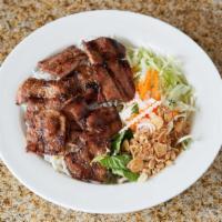 Bún Thịt Nướng - Honey Lemongrass · Vermicelli noodles with grilled pork or chicken, bean sprouts, cucumbers, lettuce, basil, pi...