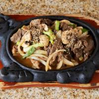 Bò Xào - Beef Bulgogi · Sliced beef marinated with Korean style sauce mushrooms, onion, green onion and served with ...