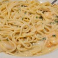 Shrimp Linguine · Linguine Noodles Tossed With Sautéed Shrimp In A White Wine Creamy Butter Sauce