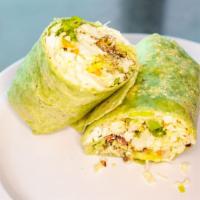 Pesto Chicken Wrap (Regular) · Fresh greens, cabbage, basil pesto chicken, bacon, feta cheese rolled into spinach wrap.