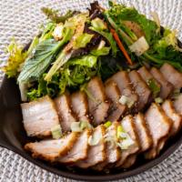 Braised Pork Belly · Comes with pickled radish, rice, salad.