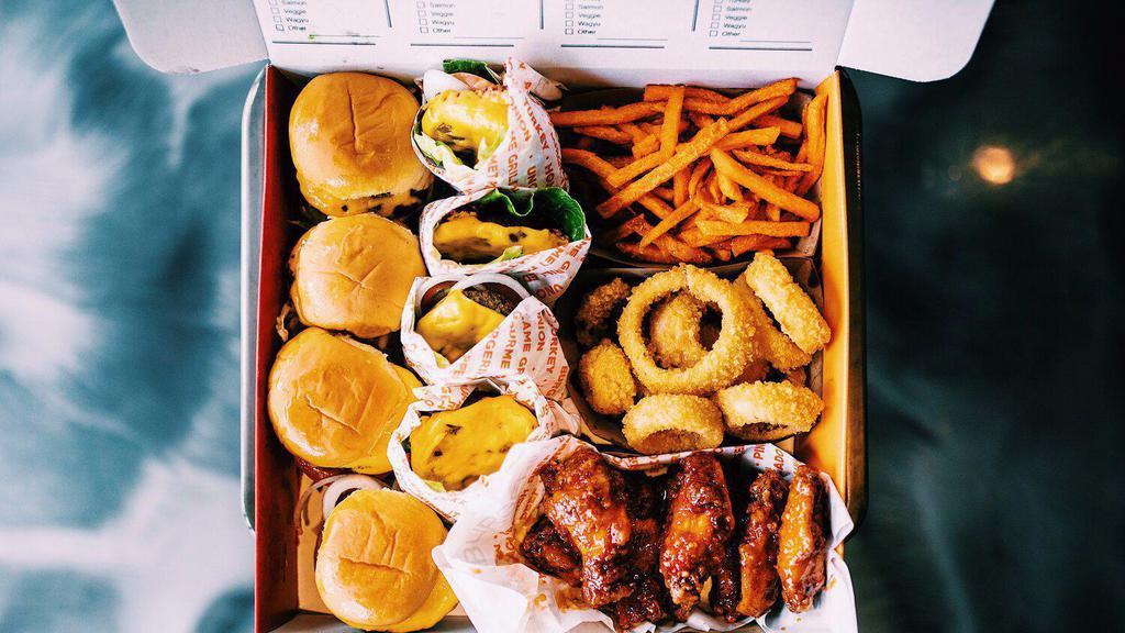Family Box · Eight of our 3 oz gourmet mini burgers. Choose up to two styles of burgers. Your choice of two sides and either eight wings or 6 chicken strips.