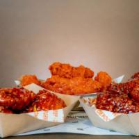 Chicken Wings - 6 Pieces · 6 Pieces of our breaded wings fried and tossed in the sauce of your choice. Or order them na...