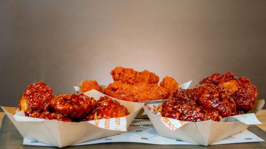 Chicken Wings - 6 Pieces · 6 Pieces of our breaded wings fried and tossed in the sauce of your choice. Or order them naked for a southern style bone-in wing.