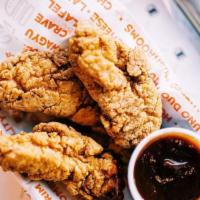 Crispy Chicken Strips  · 4 Pieces of our battered chicken strips, crisped to perfection.