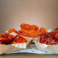 Chicken Wings - 12 Pieces · 12 Pieces of our breaded wings fried and tossed in the sauce of your choice. Or order them n...