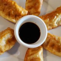 Potstickers · (Steamed or Fried). Ground chicken and vegetables are seasoned and made into dumplings. Our ...